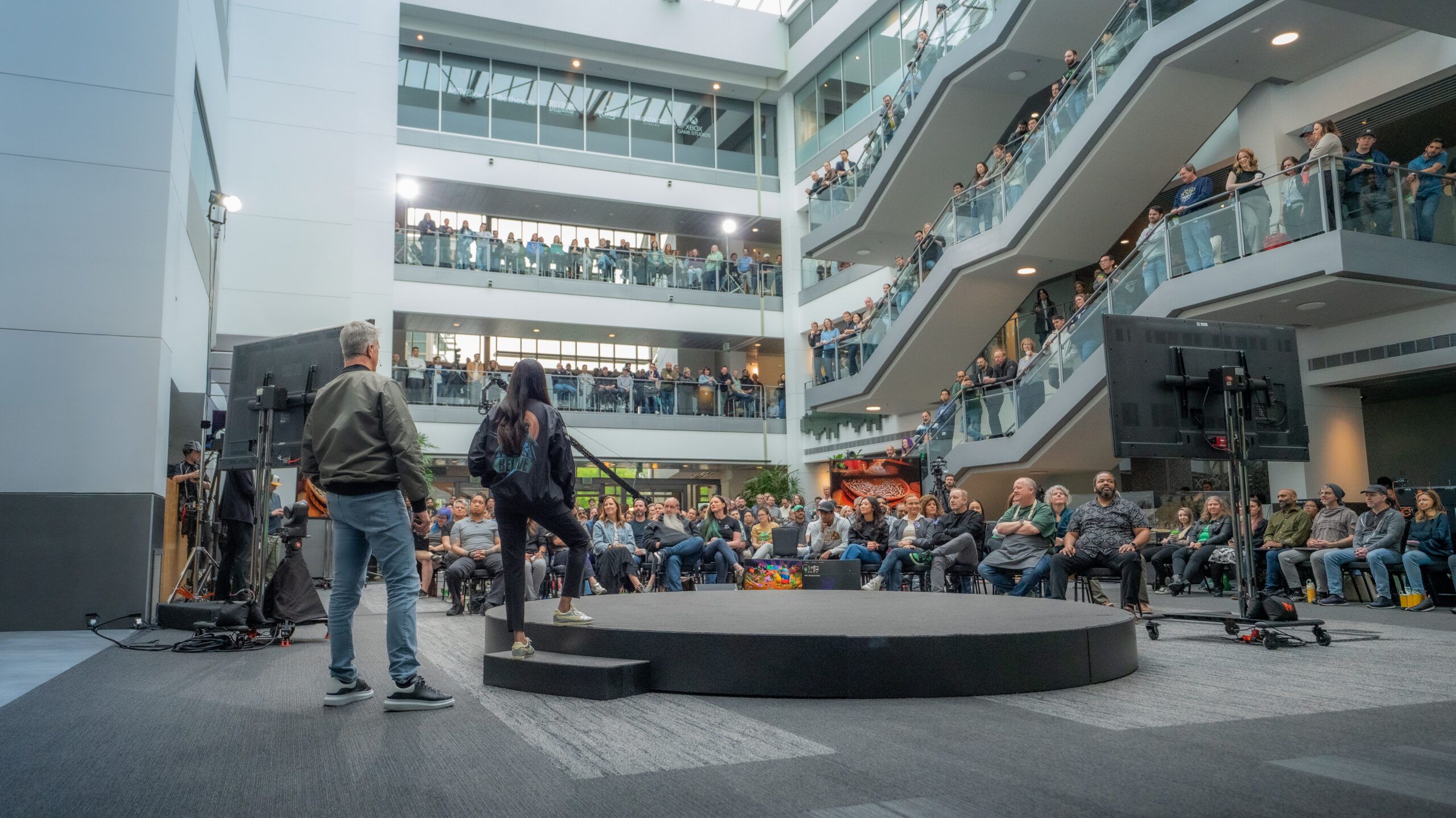 A profile of Asha Sharma, an outsider elevated by Satya Nadella to lead Xbox, where she made sweeping job cuts and shed game studios within her first few months