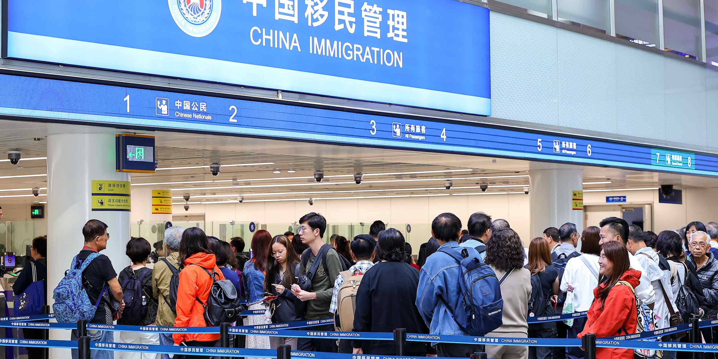 China tightens overseas travel controls for citizens via exit bans and fines in a sweeping new law, as Beijing moves to secure state secrets and advanced tech